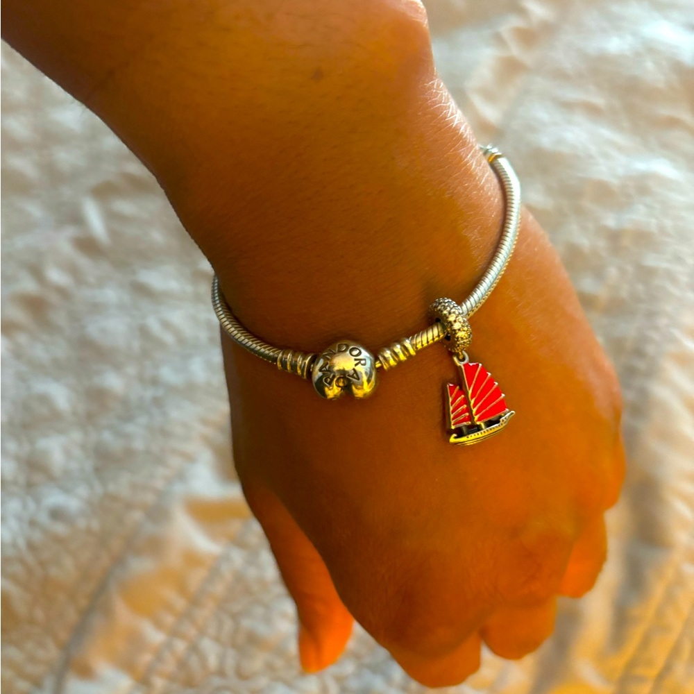 Pandora bracelet and sailboat charm